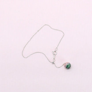 Adjustable silver chain bracelet with dangling porcelain charm handmade in London