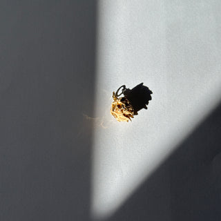 beige artichoke pendant