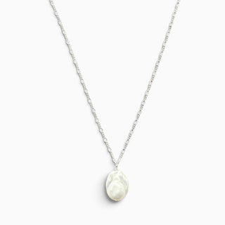 Matte white porcelain baroque pearl porcelain pendant on a 60cm silver Figaro chain, handmade in London