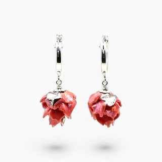 A pair of silver hoop earrings with dangling bright pink flower charms - beautiful gift for wife