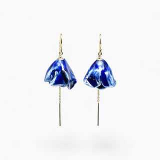 A pair of handmade dangle earrings featuring textured peony-shaped cobalt blue glazed porcelain pendants with gold-tone drop chains. Perfect surprise for girlfriend