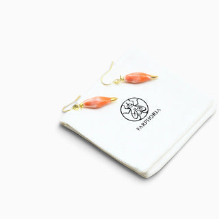 Peacock-inspired porcelain earrings with 24K gold accents, a luxury Valentine’s Day gift for a partner