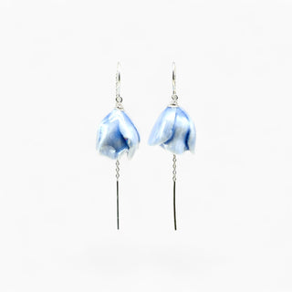 A pair of silver dangle earrings featuring peony flowers suspended from delicate silver chains - the best gift for 18th anniversary