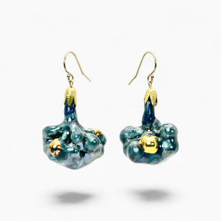A pair of handmade dangle earrings featuring flower shaped of dark teal and blue glass with shiny gold accents and hooks. Perfect unusual gift for wife.