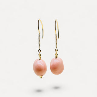 Glossy coral pink porcelain earrings with gold-filled chain drops, a beautiful handmade jewellery gift for a wife or partner.