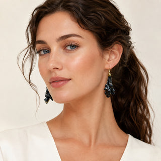 FARPHORIA model wearing dark porcelain flower earrings with delicate gold-filled hooks