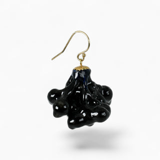 Lightweight hollow porcelain botanical earring created from a real flower collected in London