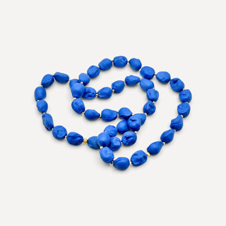 One-of-a-kind matte navy blue baroque pearl porcelain necklace for a wife or partner’s 18th anniversary.