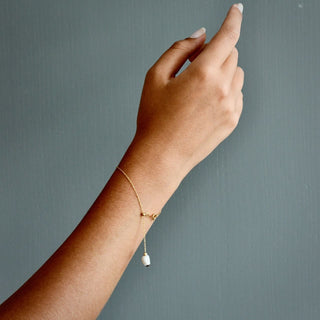 Unique handmade gold-filled bracelet with tiny porcelain bead charm