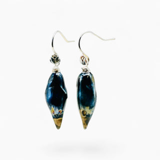 Hand-sculpted songbird earrings with sweeping golden tails, an artistic gift for a stylish mother