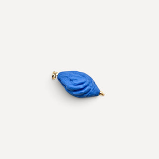 Porcelain pendant or charm with gold-tone loop and tip details resembling a peach seed - beautiful gift for wedding anniversary.