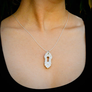 Necklace with a key-shaped pendant for your wife
