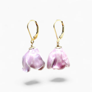 A pair of gold leverback earrings with dangling flower-shaped lavender porcelain pendants - ideal gift for 18th wedding anniversary