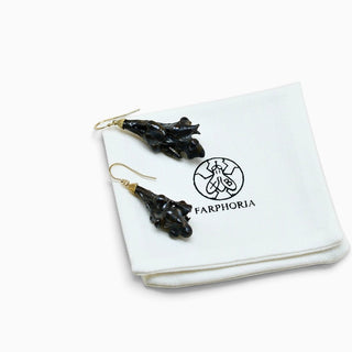 Lightweight botanical porcelain earrings with shimmering glaze and organic natural forms