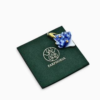 Handmade blue porcelain flower necklace pendant with gold details, a special romantic gift for her