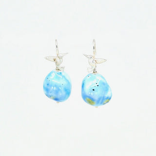 Handmade porcelain summer earrings with blue glaze and silver hummingbird hooks by FARPHORIA