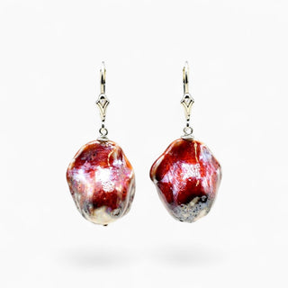 Front view of ruby red glazed porcelain pearl earrings, a unique 18th wedding anniversary gift for a wife