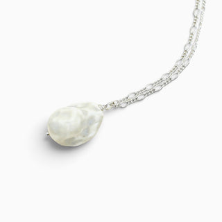 Hand-sculpted porcelain pearl necklace with a fancy silver chain for an elegant anniversary gift