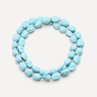 Handmade turquoise baroque pearl porcelain necklace for a partner’s 18th wedding anniversary.