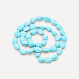 One-of-a-kind turquoise porcelain necklace with golden beads, an anniversary gift for a partner.