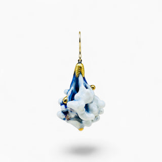 Blue and white botanical single earring made from a real plant dipped in porcelain and fired in a kiln