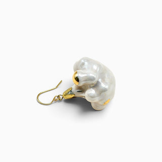 Real fatsia flower transformed into a delicate porcelain single earring by FARPHORIA in London