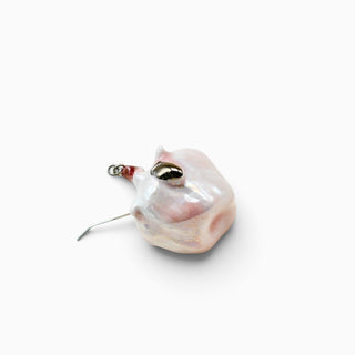 Sculptural single earring made from a real flower of a rose dipped in porcelain and finished by hand