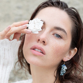 Unique mismatched porcelain earring for a woman who prefers jewellery that nobody else owns